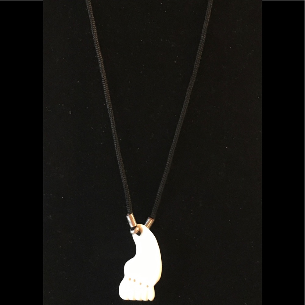 Beige beaded necklace with foot pendant